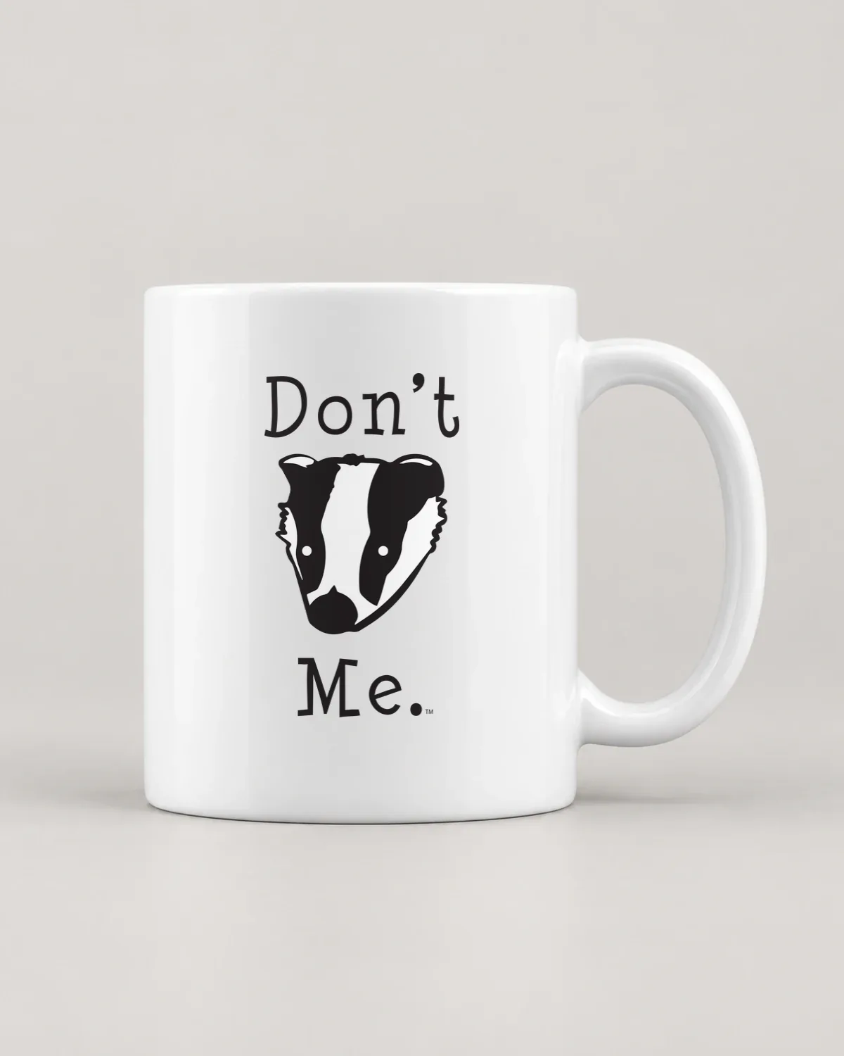 Don't Badger Me tee on a ceramic mug