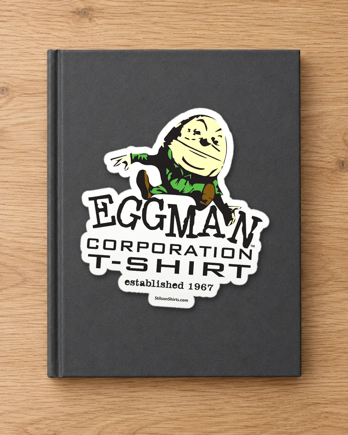 Egg Man Corporation tee on a die-cut sticker