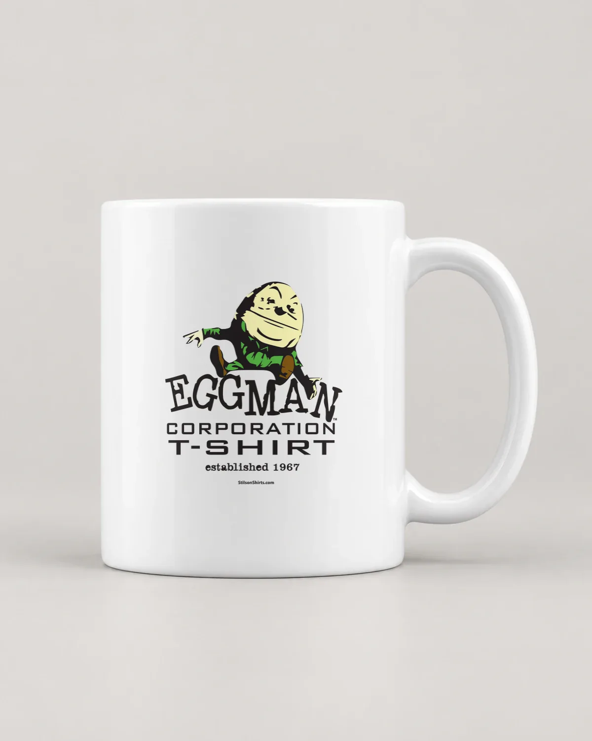 Egg Man Corporation tee on a ceramic mug