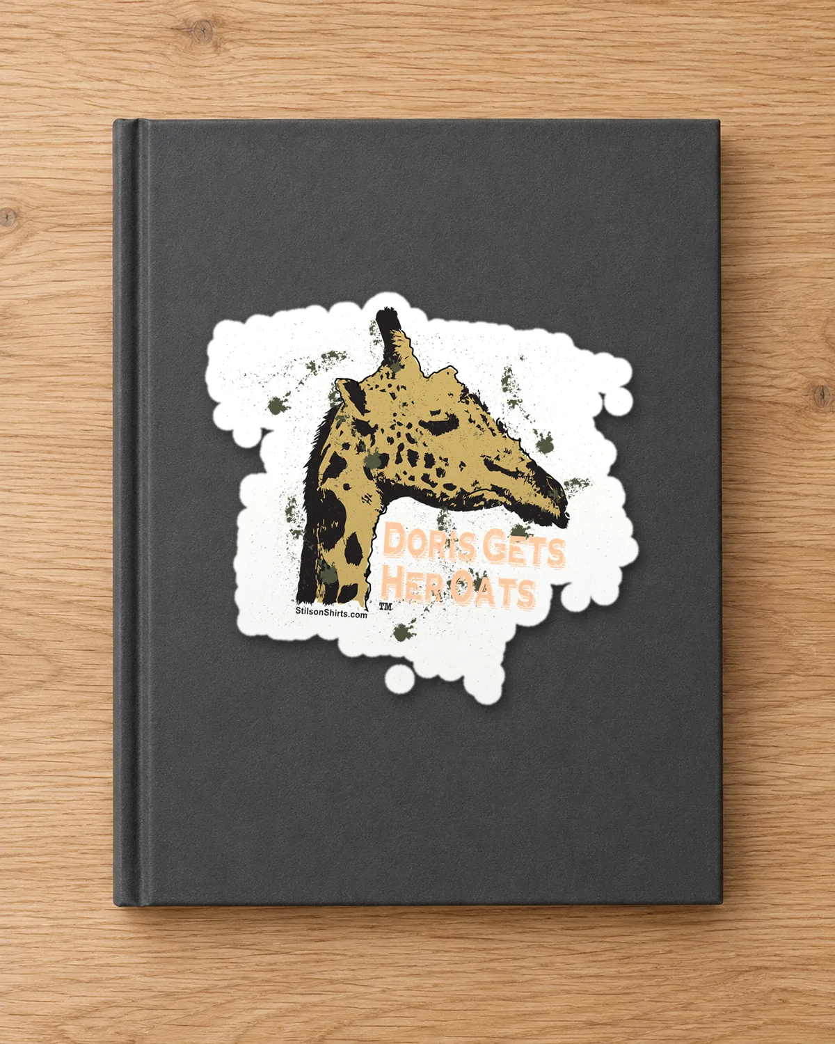 Giraffe Gets Her Oats tee on a die-cut sticker
