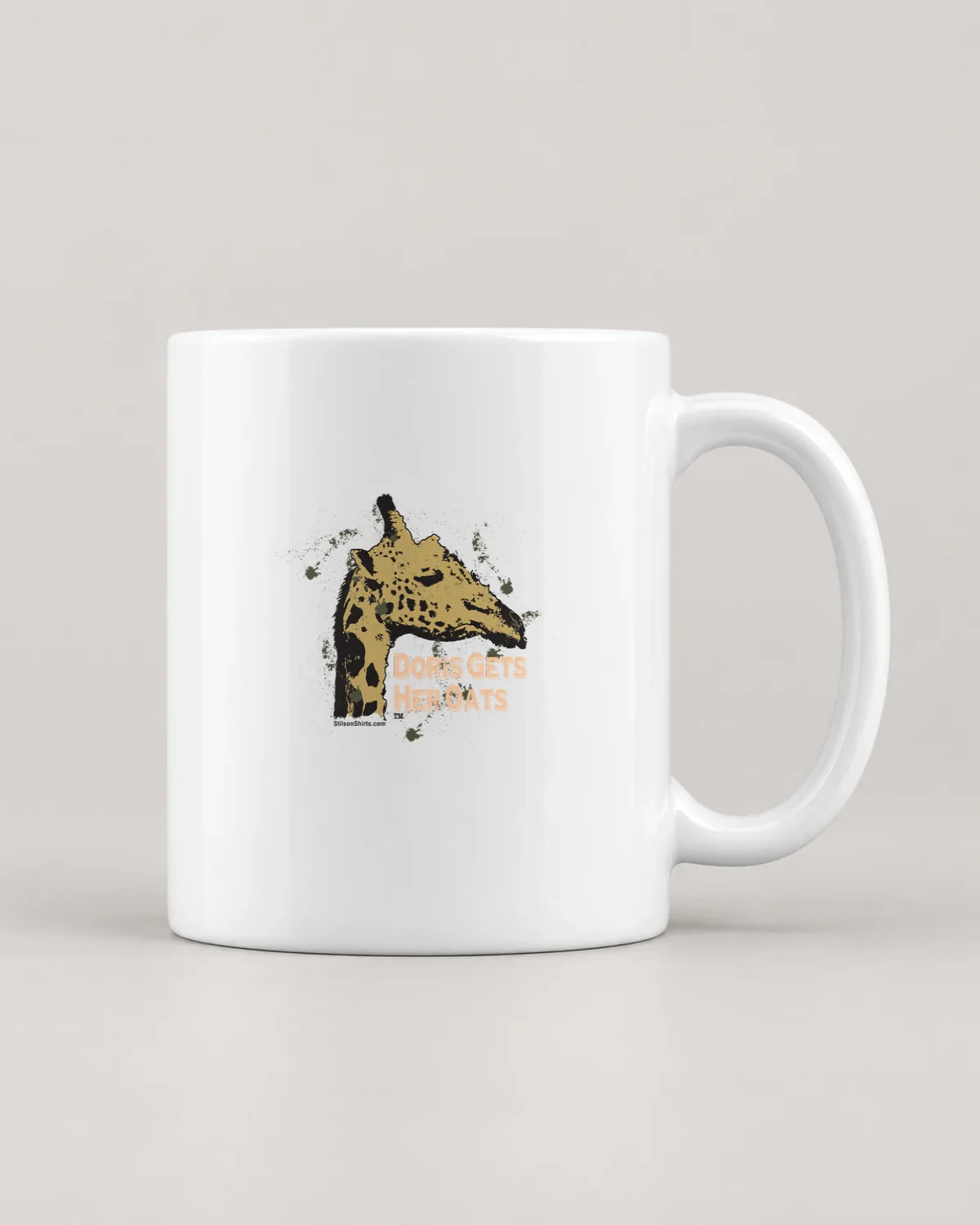 Giraffe Gets Her Oats tee on a ceramic mug