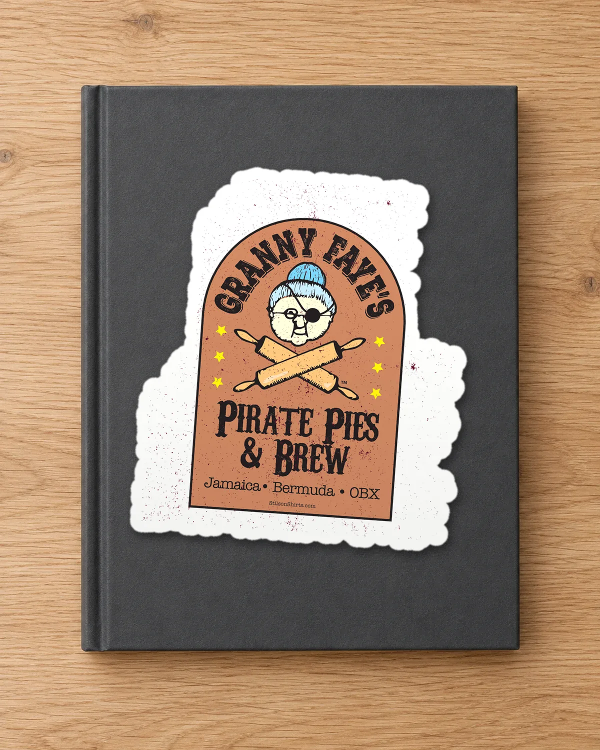 Granny Faye's Pirate Pies & Brew tee on a die-cut sticker