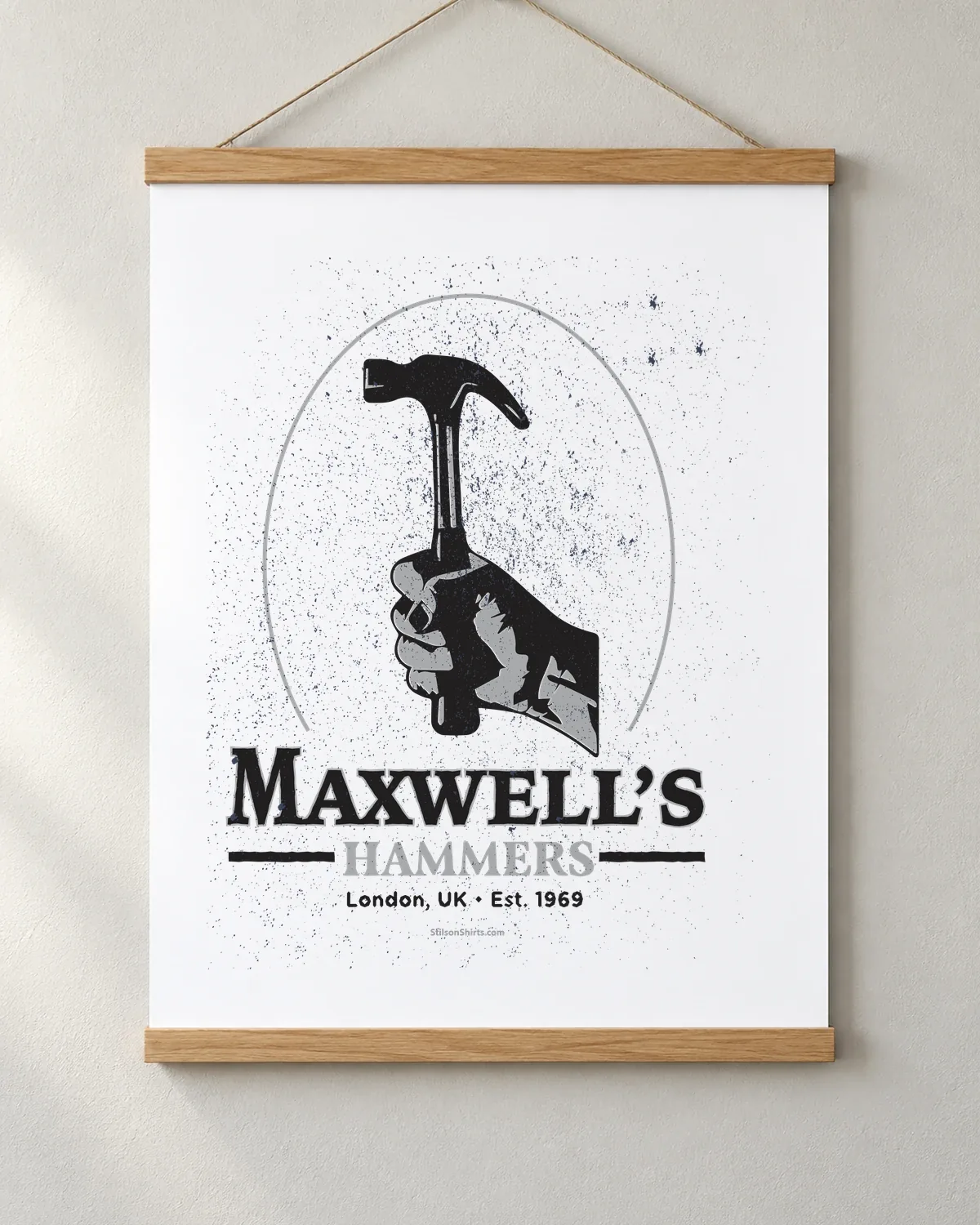Hammer Works tee on a matte poster