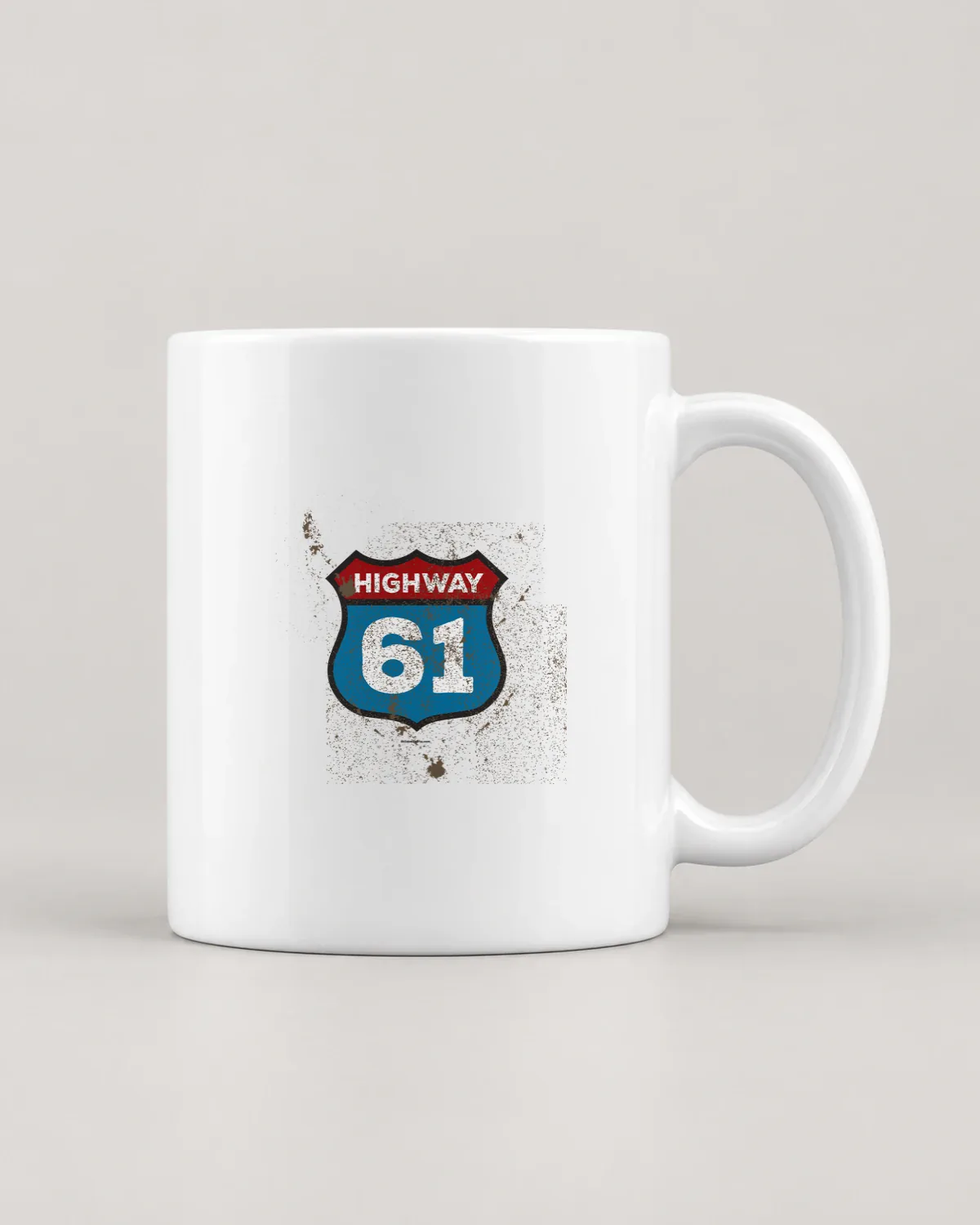 Highway 61 Shield tee on a ceramic mug