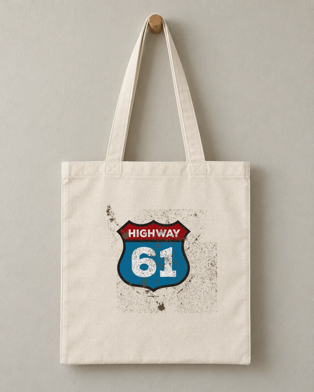 Highway 61 Shield tee on a cotton tote