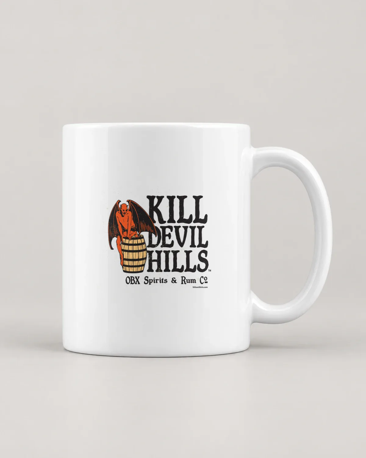Kill Devil Hills Spirits & Rum tee on a ceramic mug