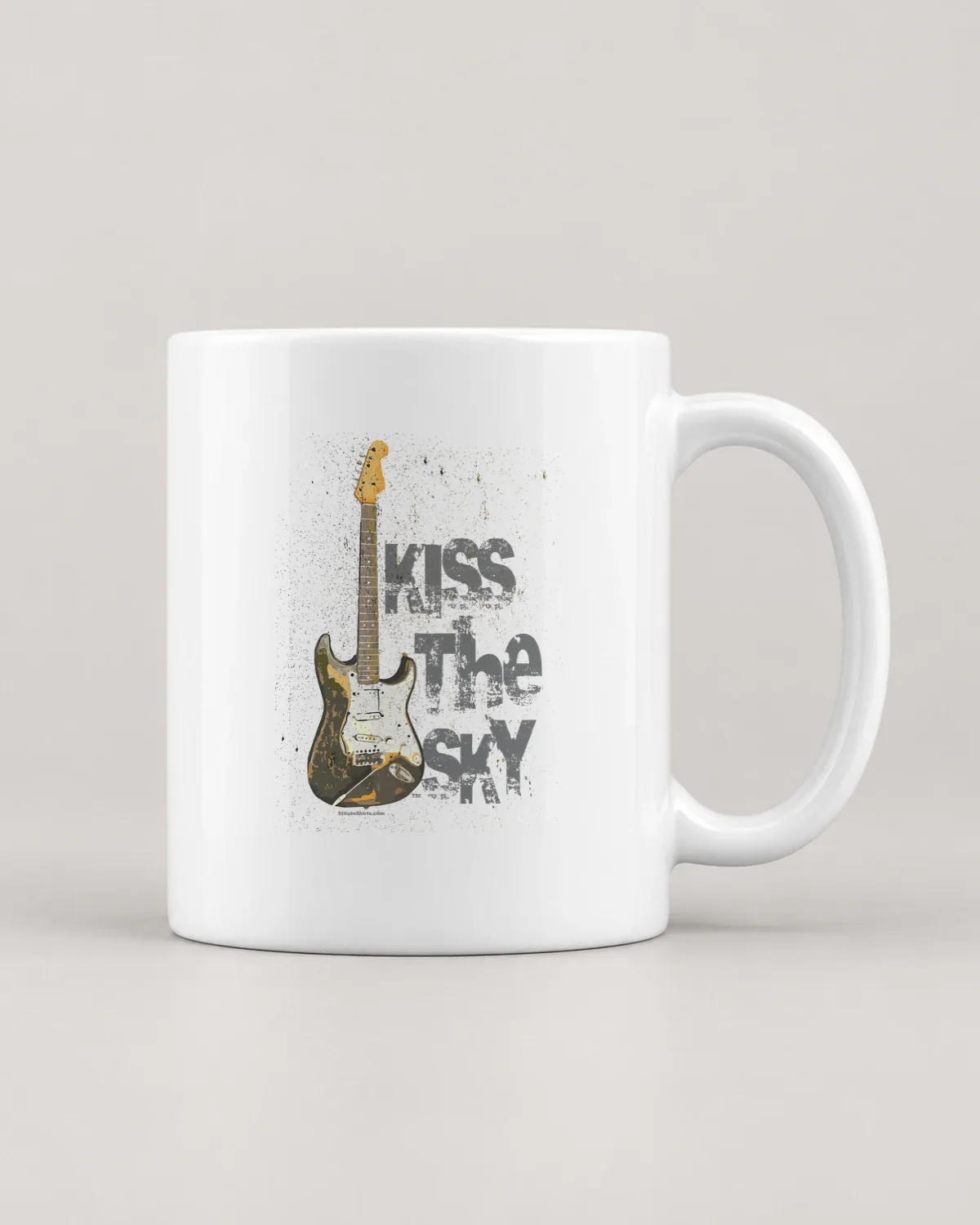 Kiss the Sky Guitar tee on a ceramic mug