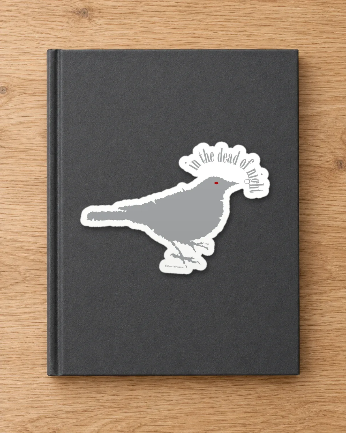 Night Bird tee on a die-cut sticker