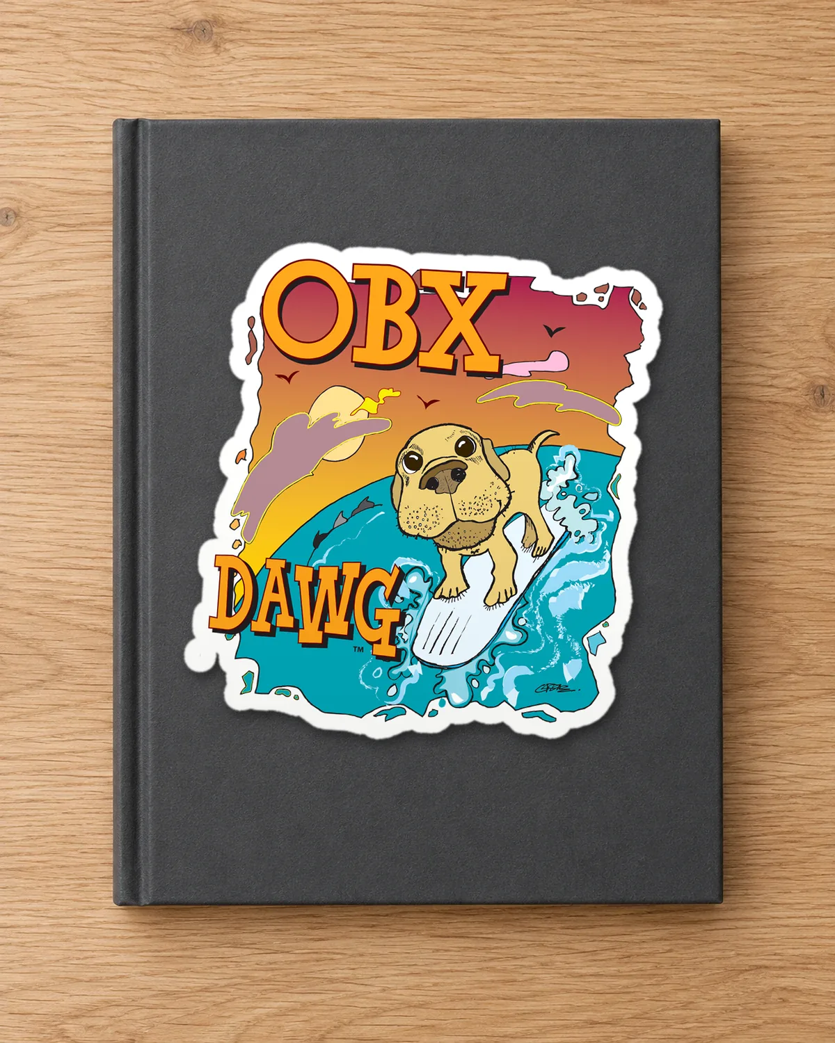 OBX Dawg tee on a die-cut sticker