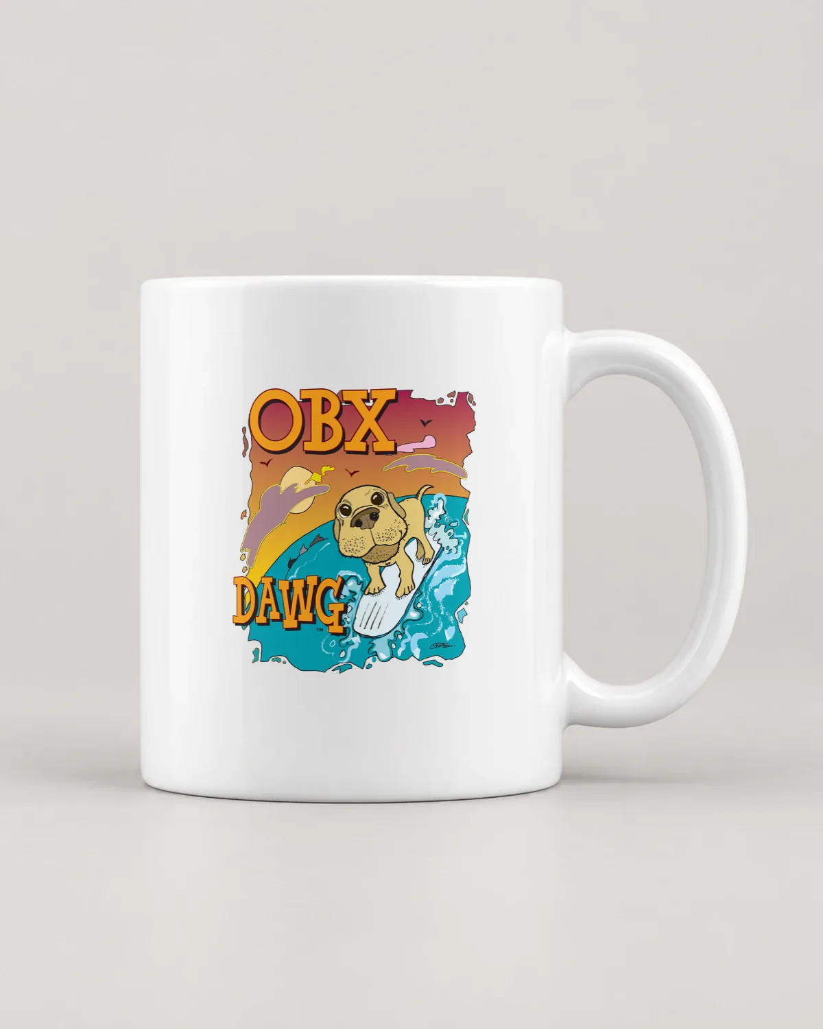 OBX Dawg tee on a ceramic mug