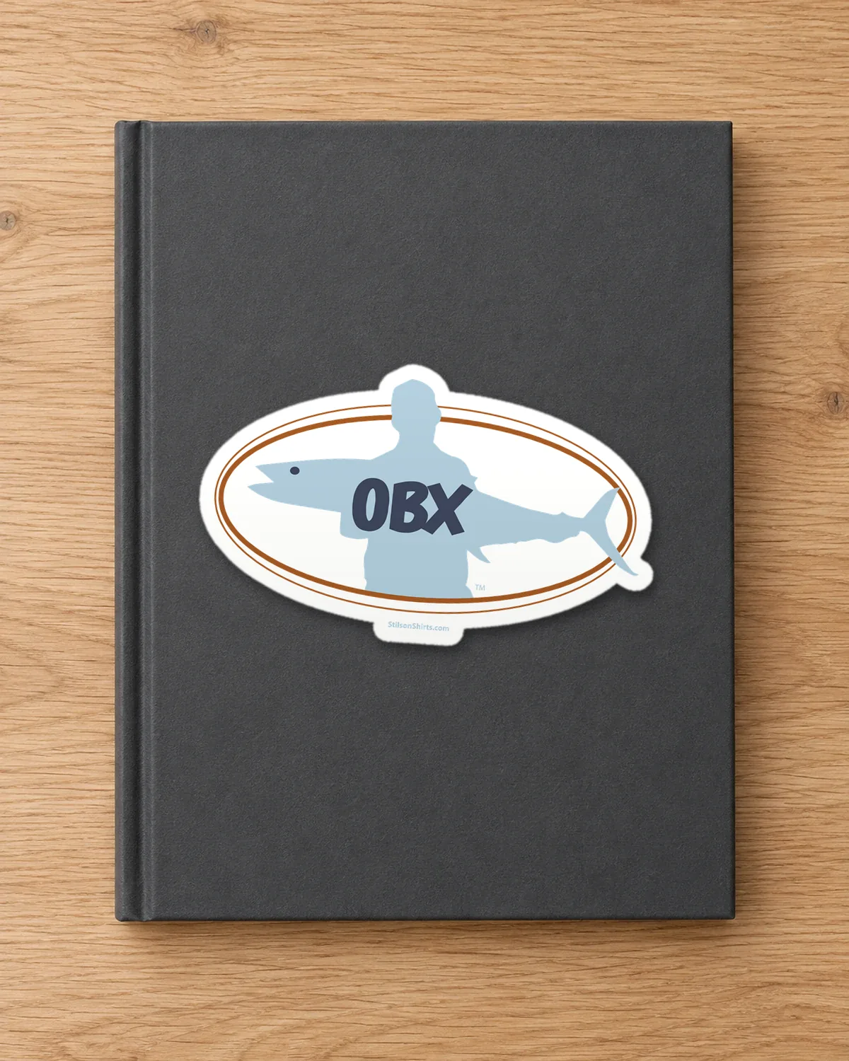 OBX Fish Oval tee on a die-cut sticker