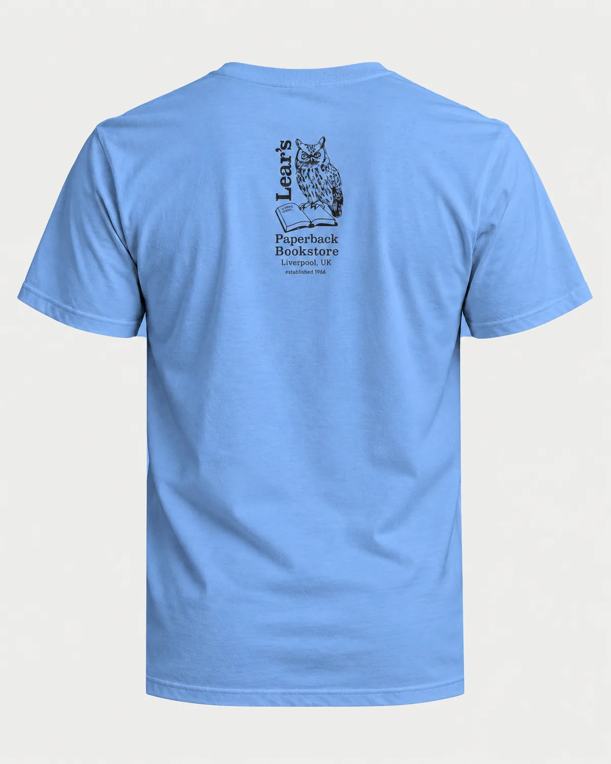 Owl's Paperback Bookstore tee on a carolina blue tee, back view