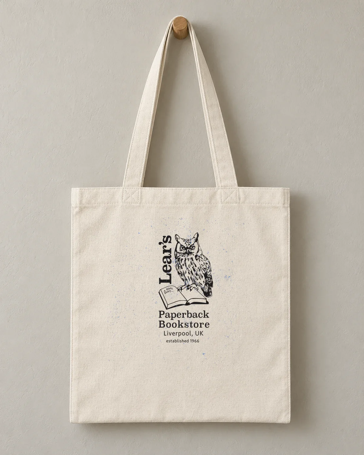 Owl's Paperback Bookstore tee on a cotton tote