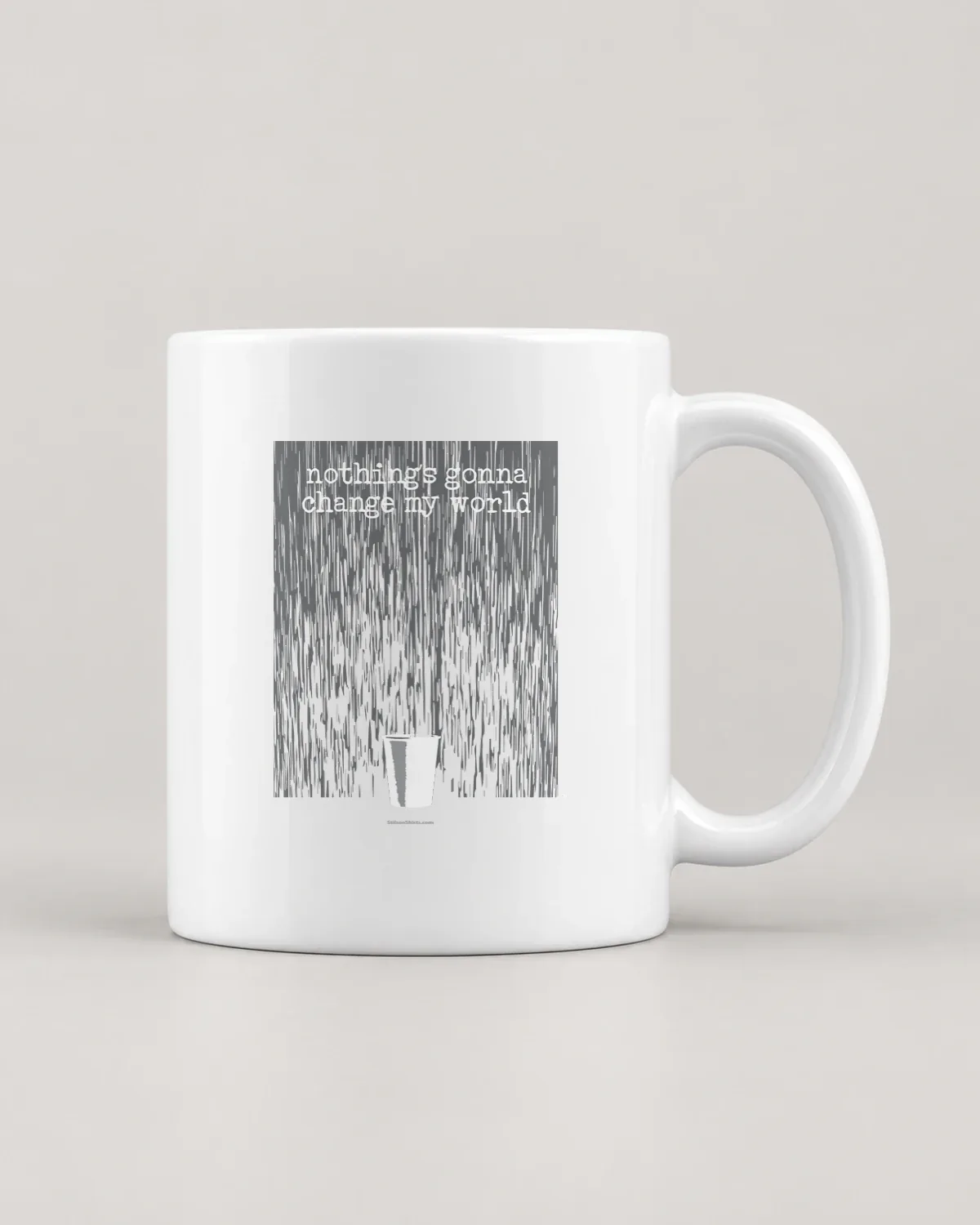 Paper Cup in the Rain tee on a ceramic mug