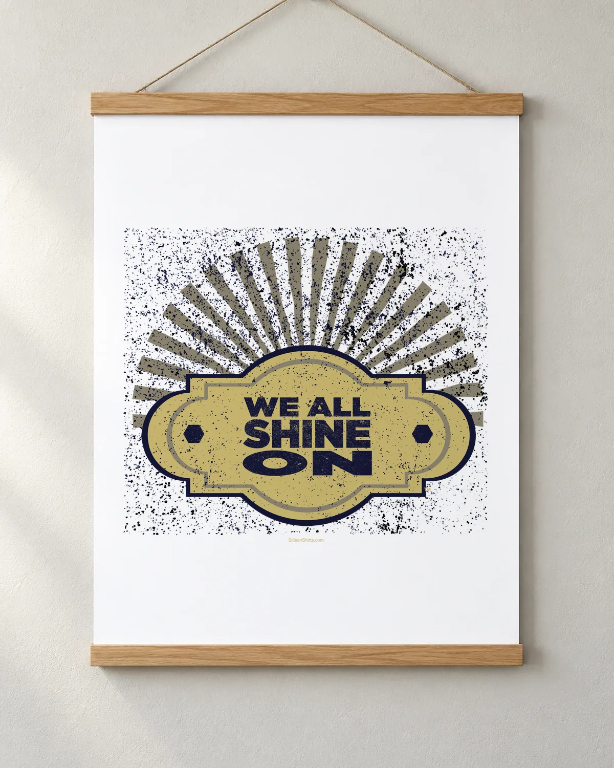 We All Shine On tee on a matte poster