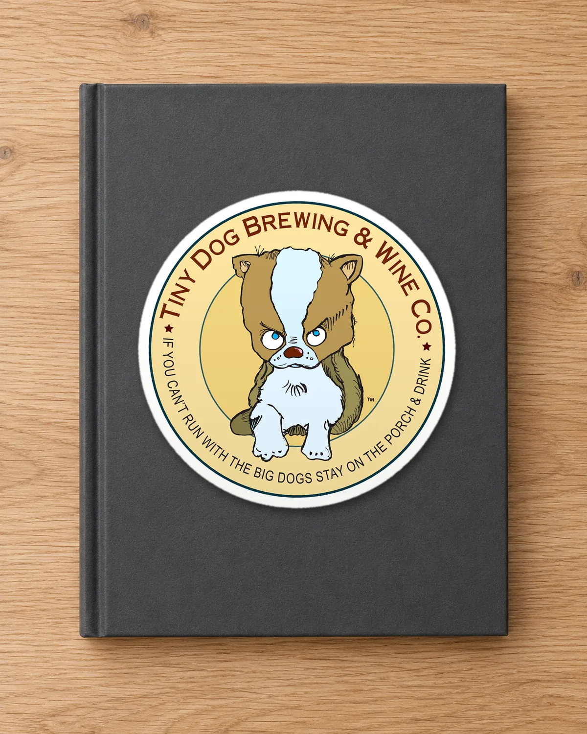 Tiny Dog Brewing & Wine Co. tee on a die-cut sticker